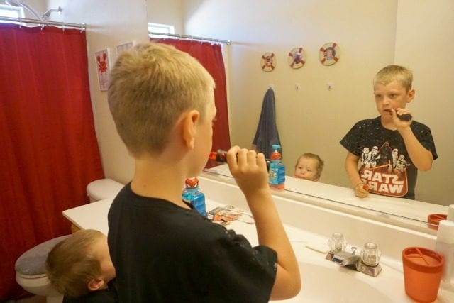 Boys brushing teeth