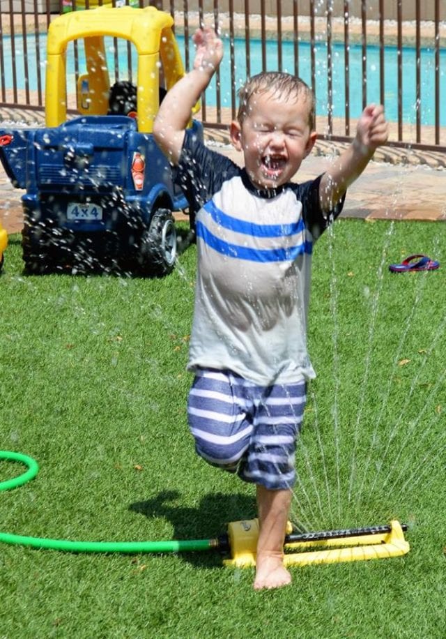 harry-running-through-sprinkler