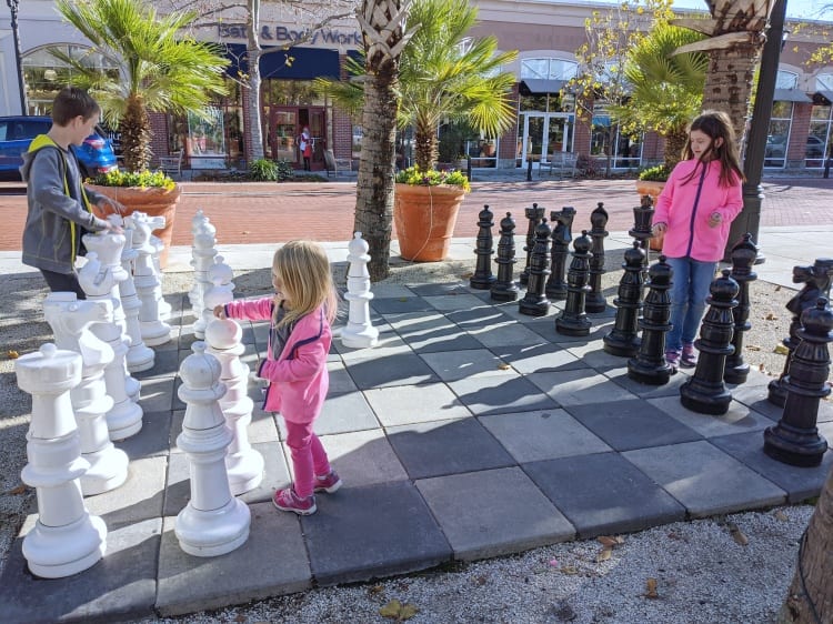 kids playing giant chess